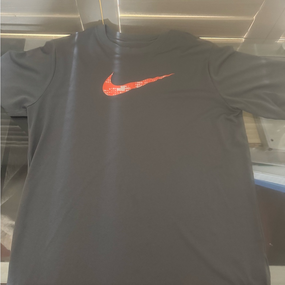 Nike Black T-Shirt with Red Patterned Swoosh